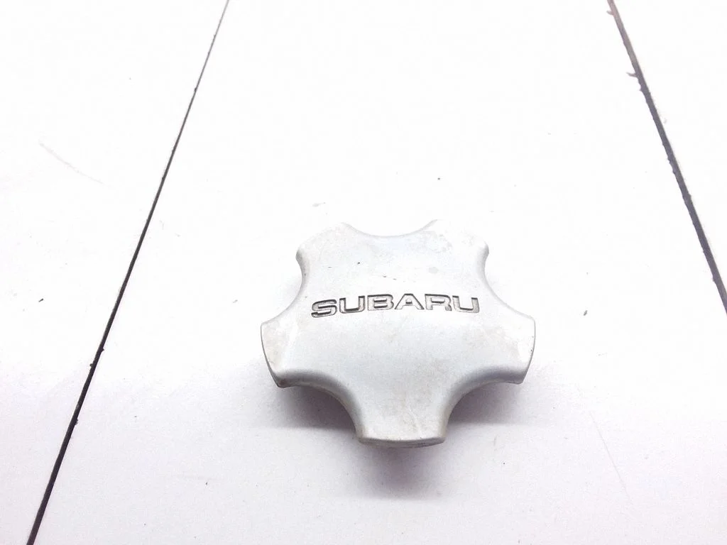 Oriģināls riteņa rumbas vāciņš (-i) – Subaru Legacy (1999-2003)