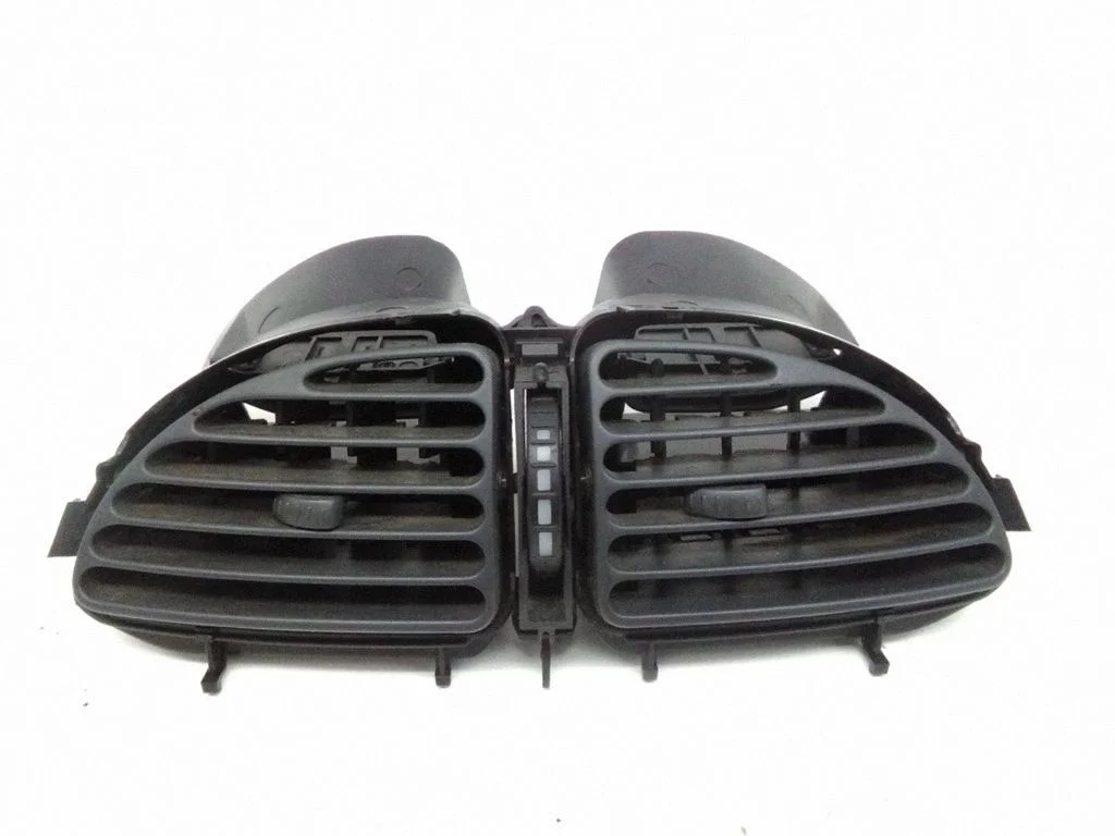 Dash center air vent grill 99024320