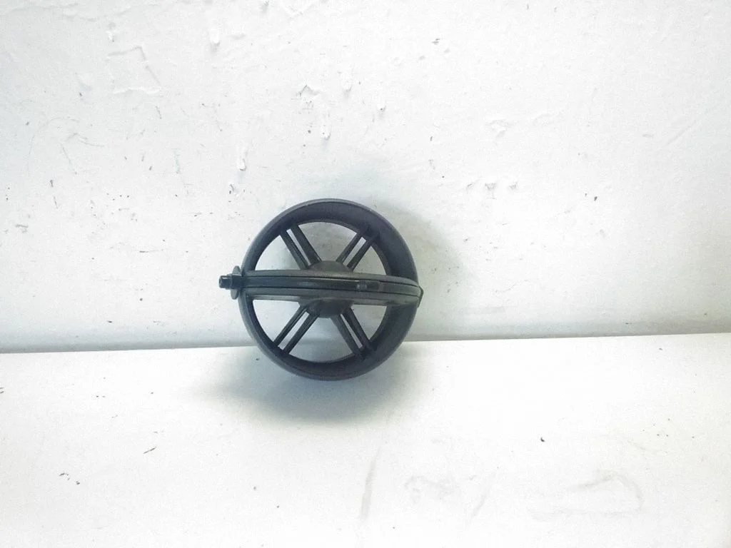 Dash center air vent grill