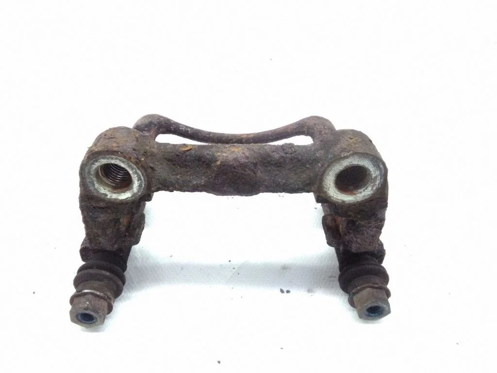 Brake caliper pad carrier rear