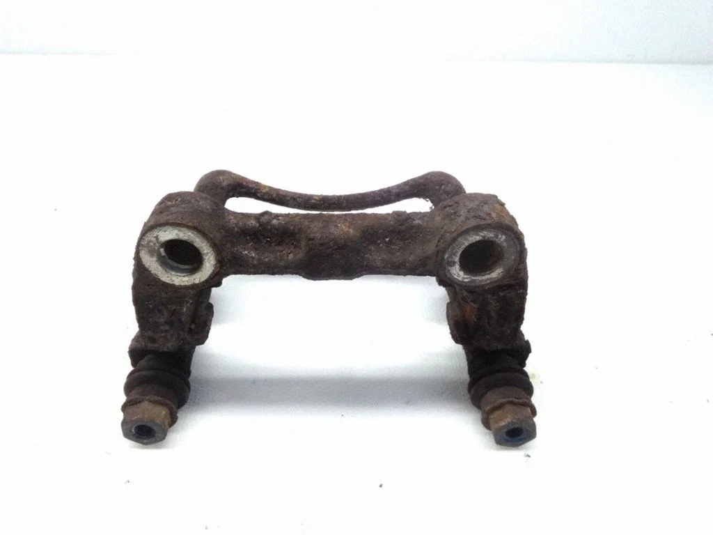 Brake caliper pad carrier rear