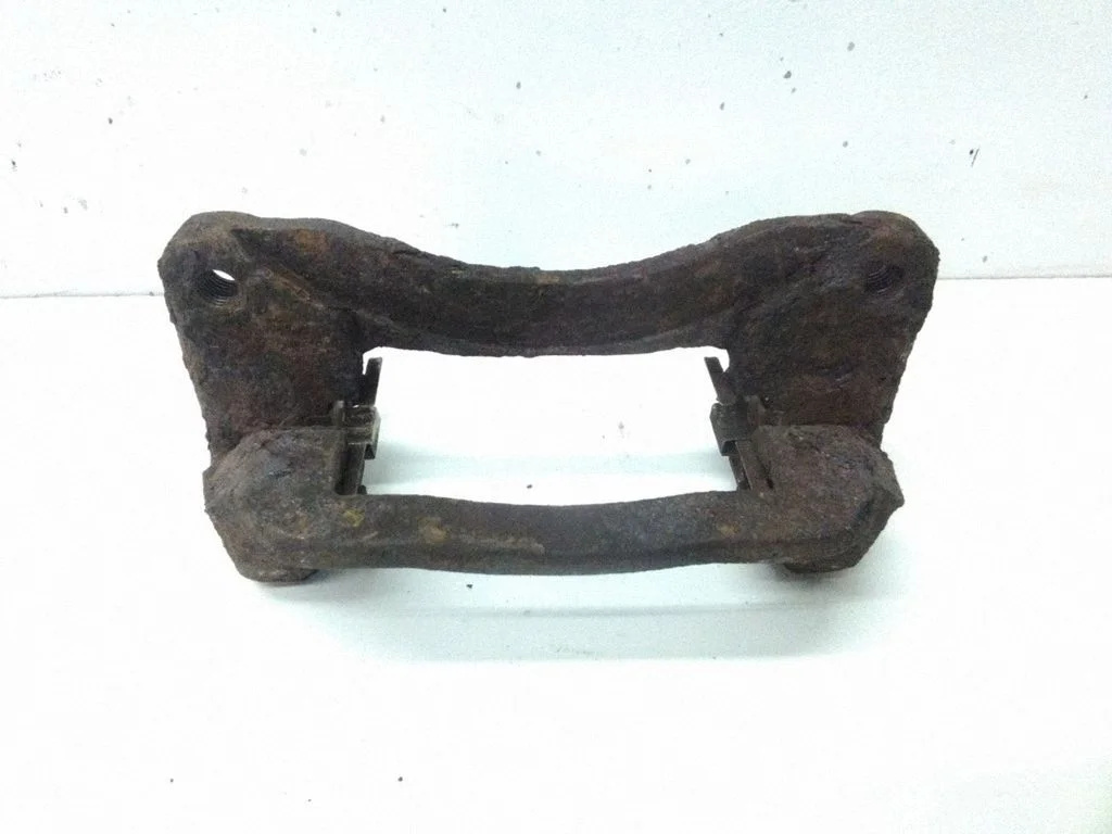 Brake caliper pad carrier rear