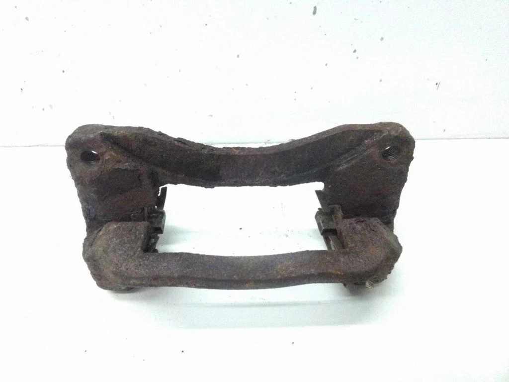 Brake caliper pad carrier rear