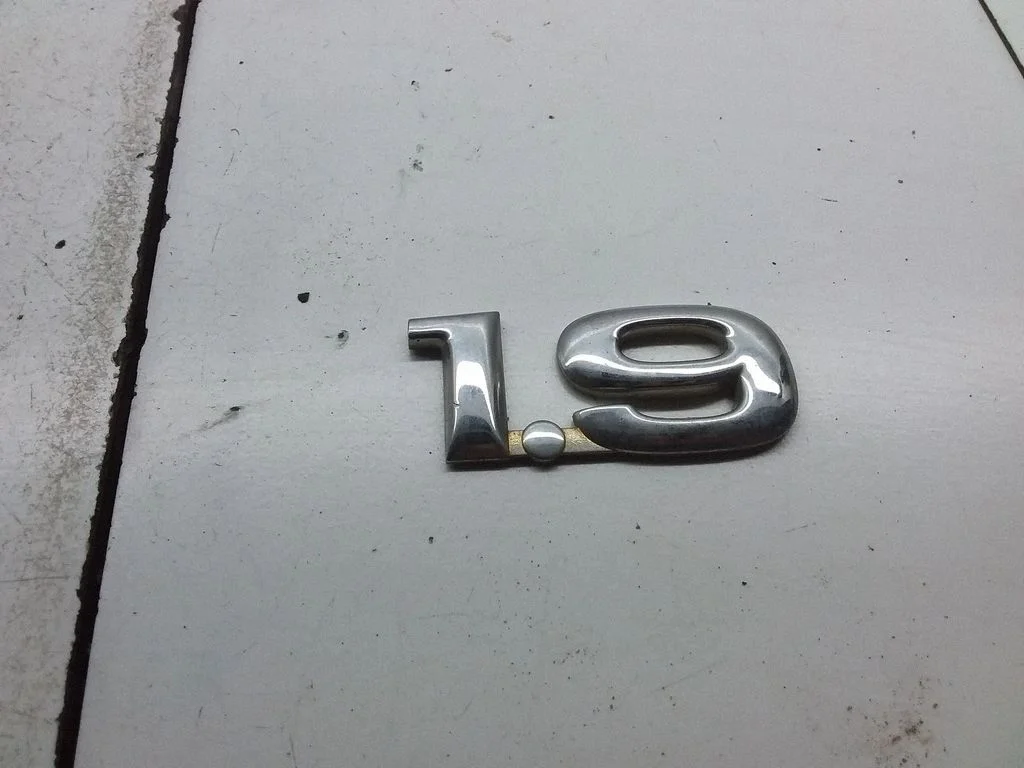 Manufacturers badge/model letters