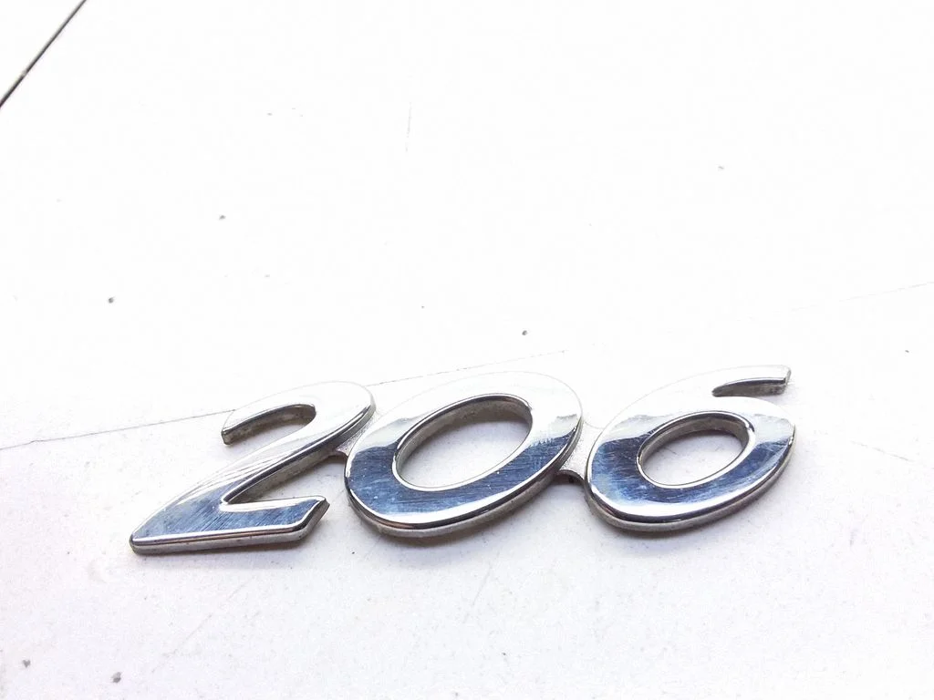 Manufacturers badge/model letters