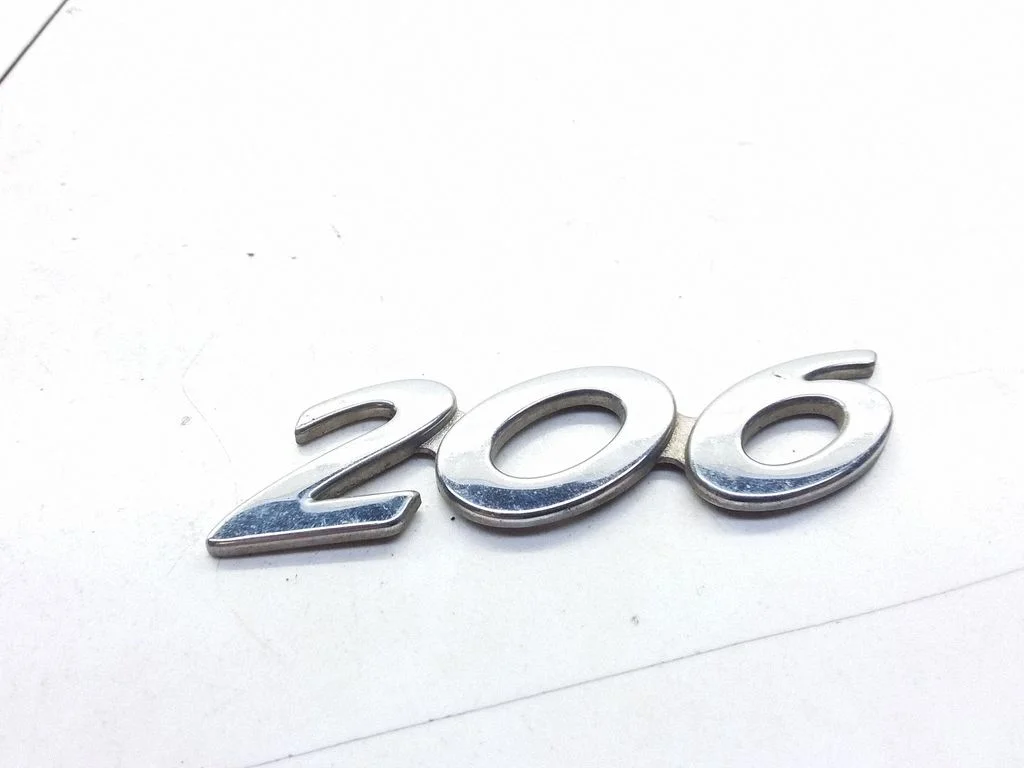 Manufacturers badge/model letters