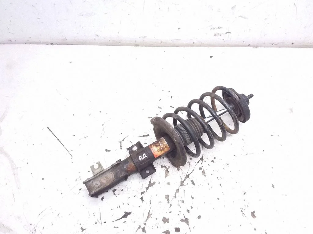 Front shock absorber with coil spring – front right