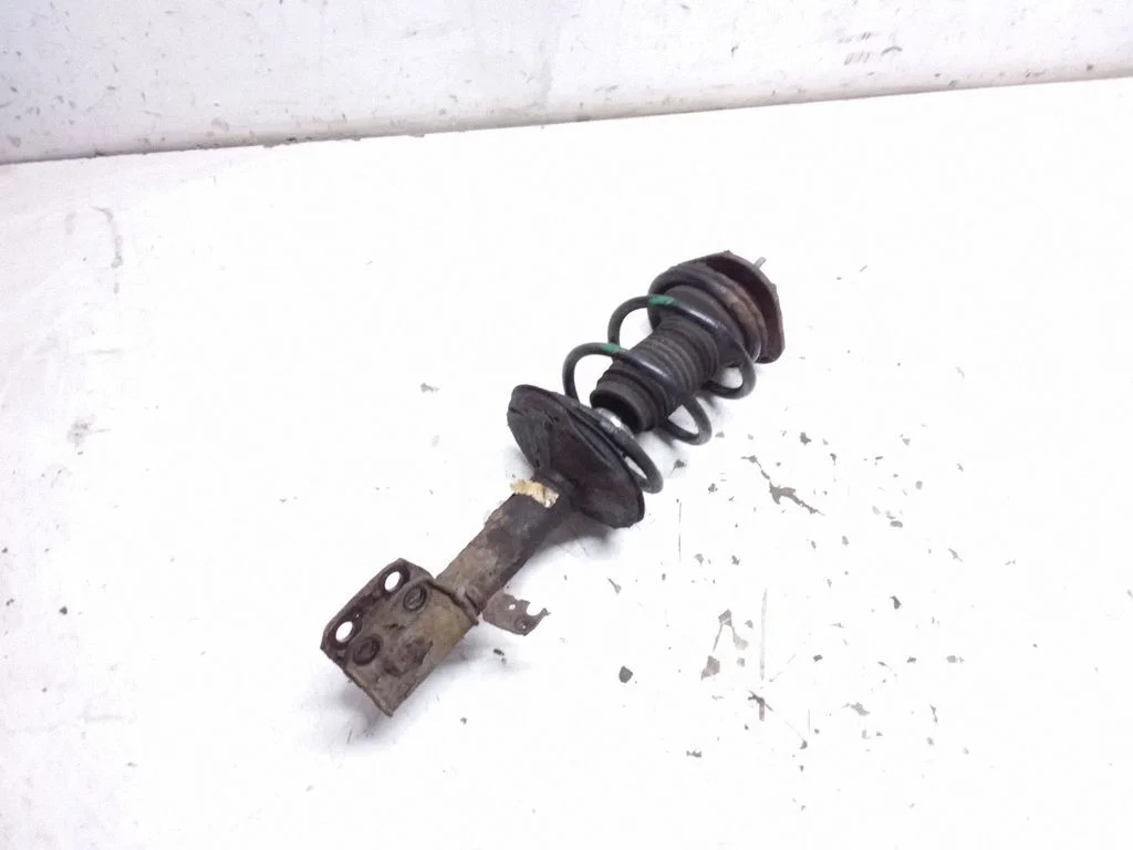Front shock absorber with coil spring – front right