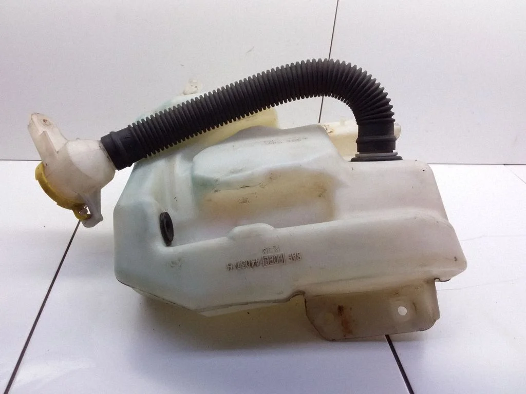Lamp washer fluid tank