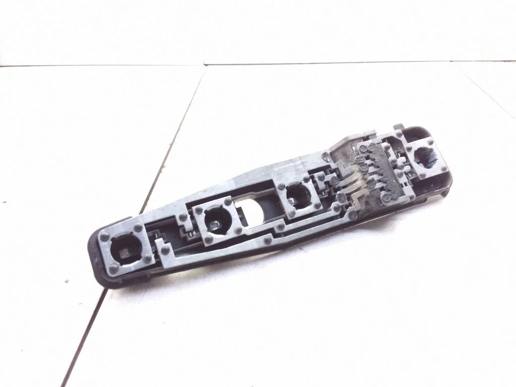 Tail light bulb cover holder
