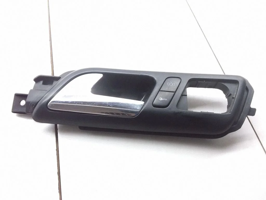 Klamka wewnętrzna drzwi przednich – Volkswagen Polo (2002-2005)