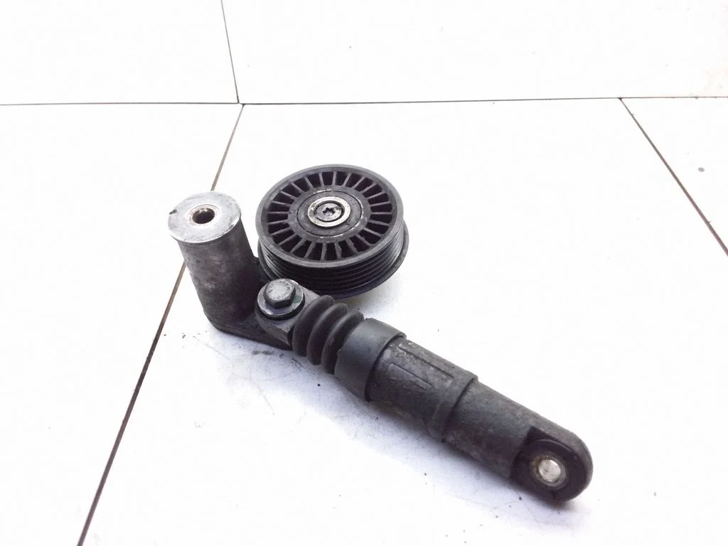 Generator/alternator belt tensioner F23470909