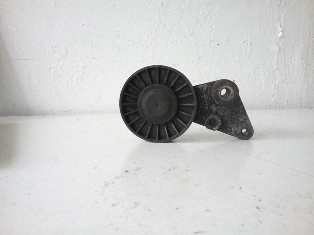 Generator/alternator belt tensioner 09180809