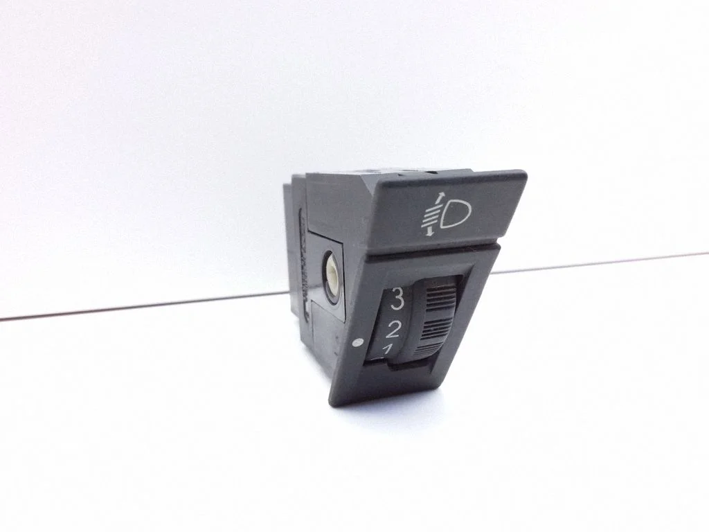 Headlight level height control switch