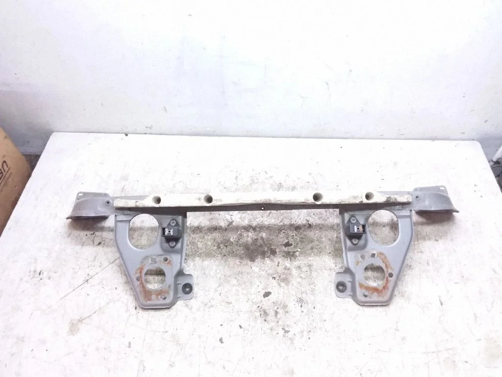 Top upper radiator support slam panel