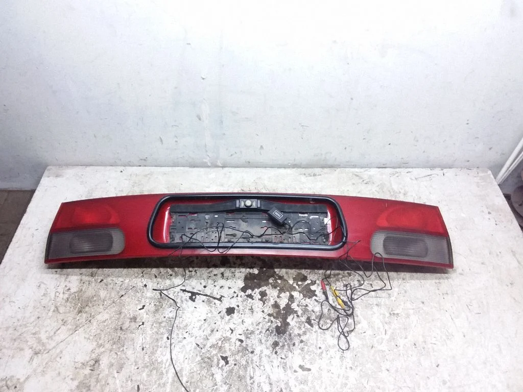 Trunk door license plate light bar 7M0943021