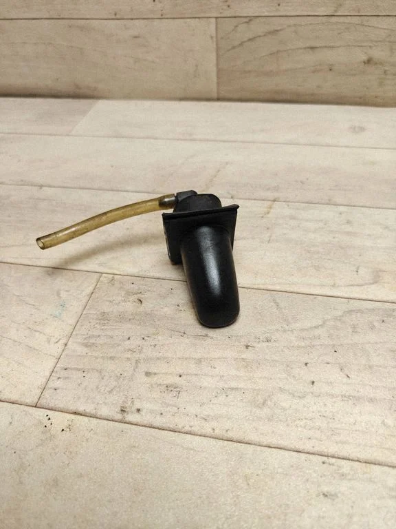 Windshield washer spray nozzle – left
