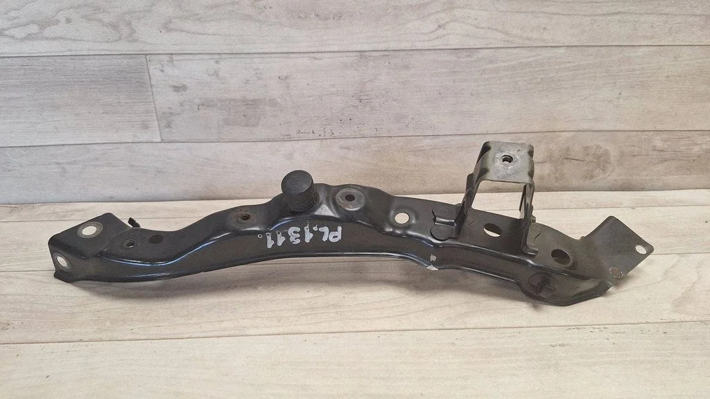 Headlight/headlamp mounting bracket – front left
