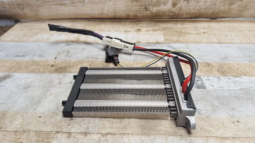Electric cabin heater radiator 8V6N18D612AC
