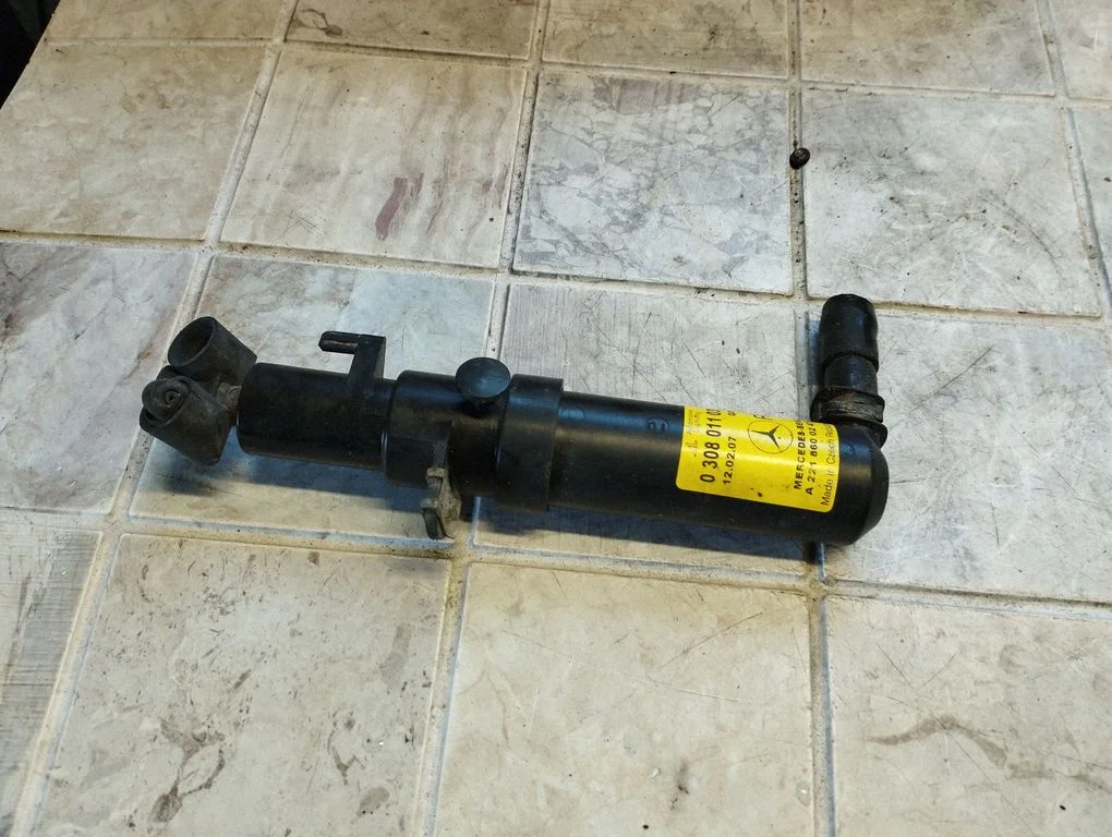 Headlight washer spray nozzle 0308011038