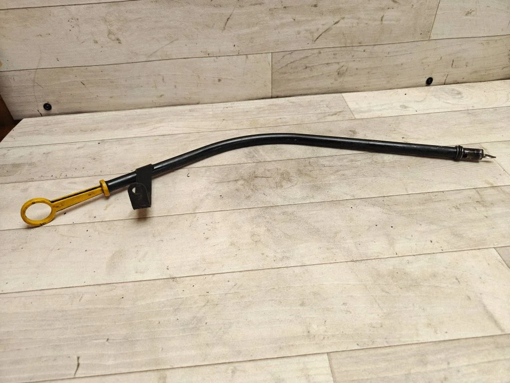 Oil level dip stick