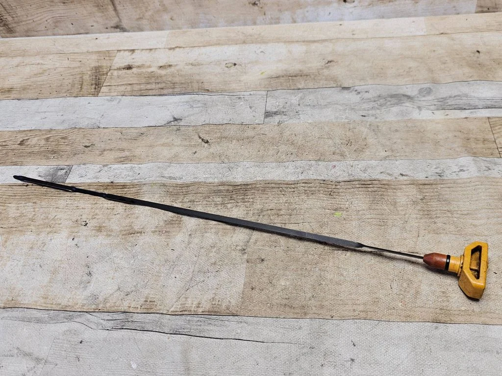 Oil level dip stick