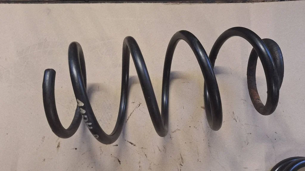 Front coil spring