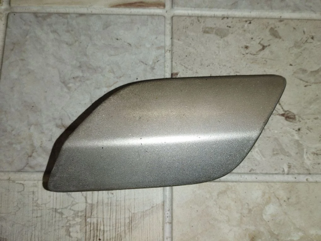 Lukturu mazgāšanas sprauslas vāciņš – Opel Astra H (2004-2012)