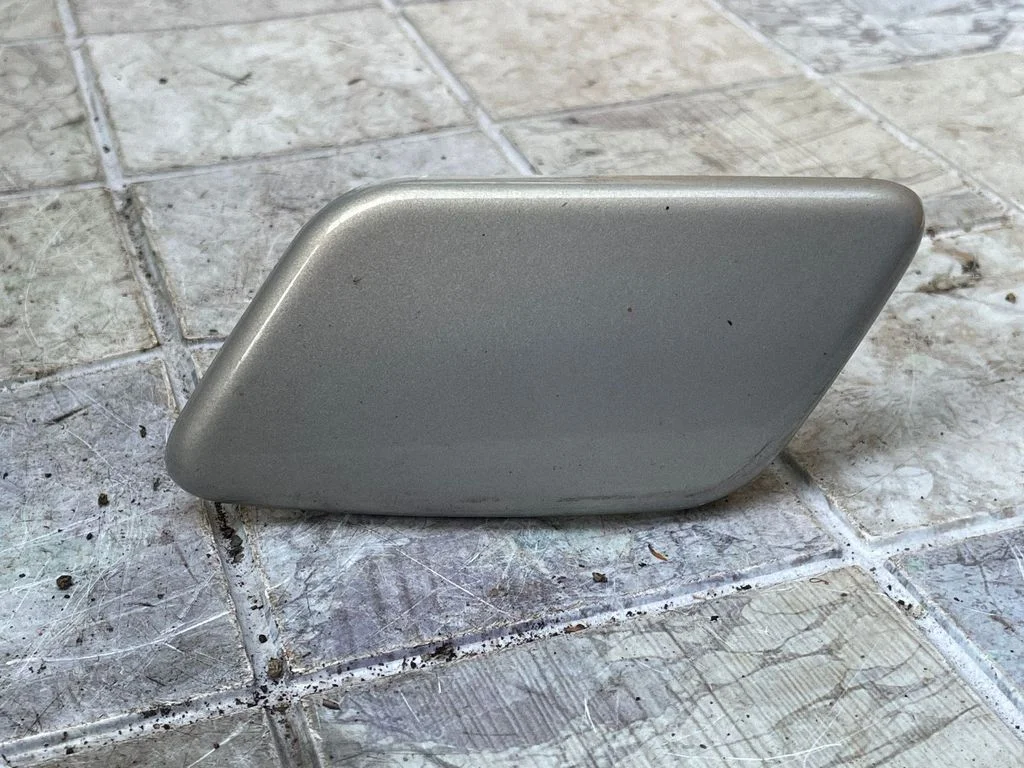 Zaślepka spryskiwacza reflektorów 04857423AA
