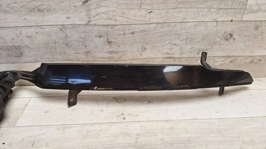 Front bumper splitter molding 865654U000