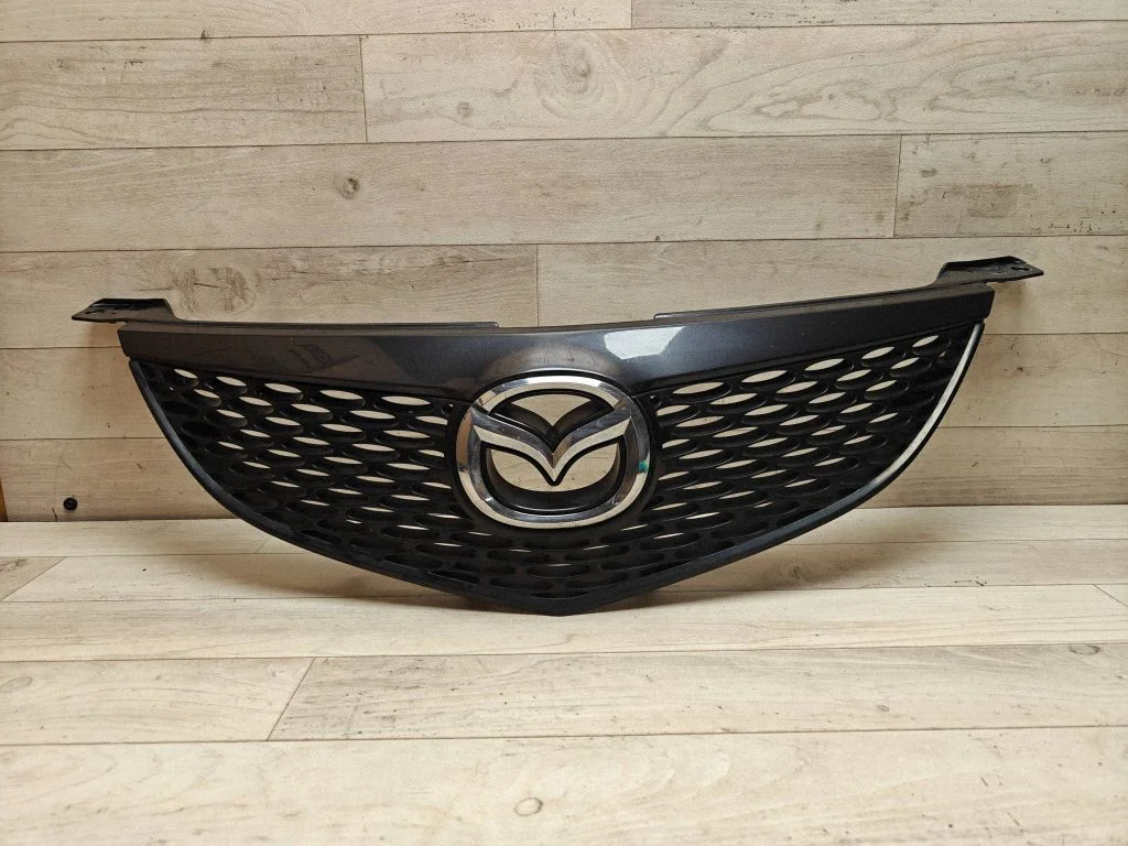 Atrapa górna (grill) – Mazda 3 I (2003-2006)