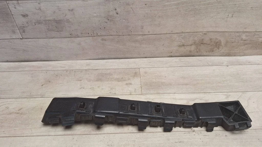 Rear bumper mounting bracket 866131H200