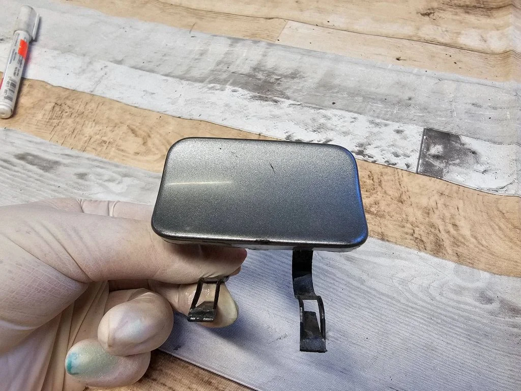 Rear bumper row hook cap/cover