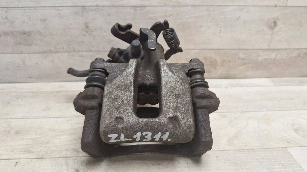 Rear brake caliper – rear left