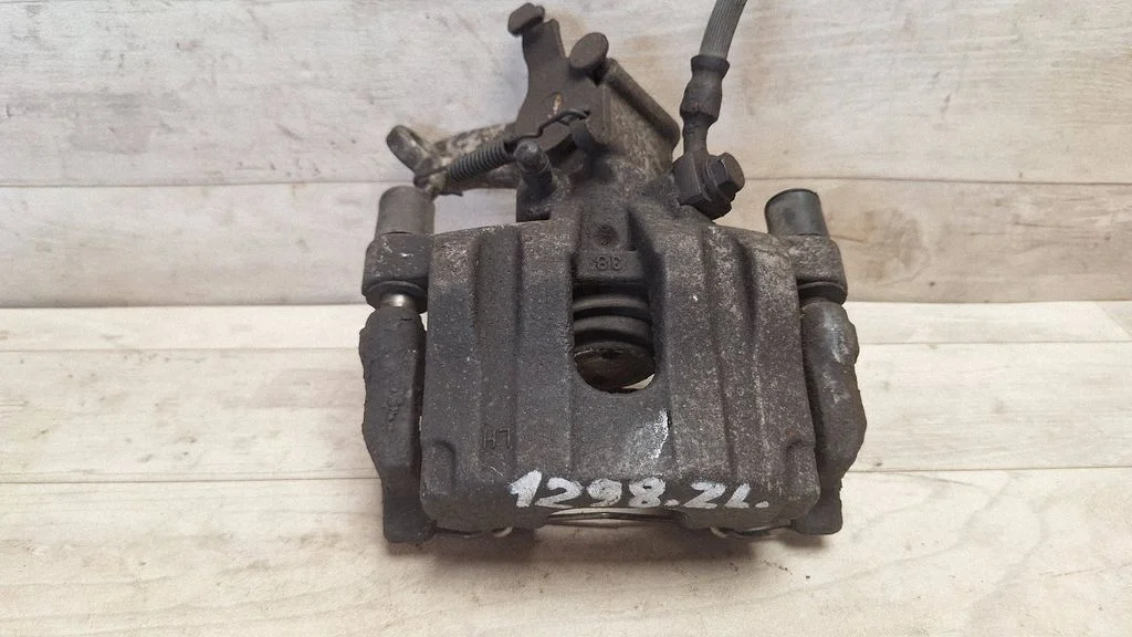 Rear brake caliper – rear left