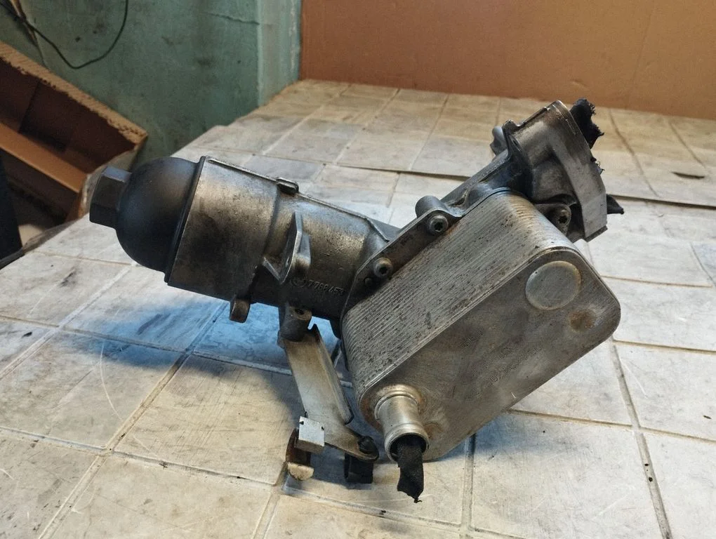 Oil filter mounting bracket 7788453