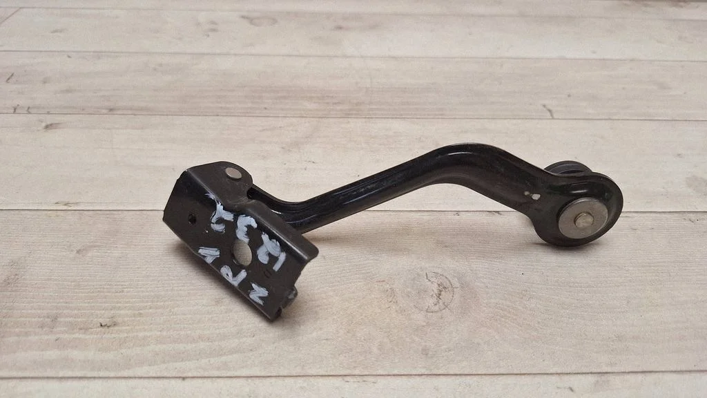 Sliding door upper roller guide/hinge