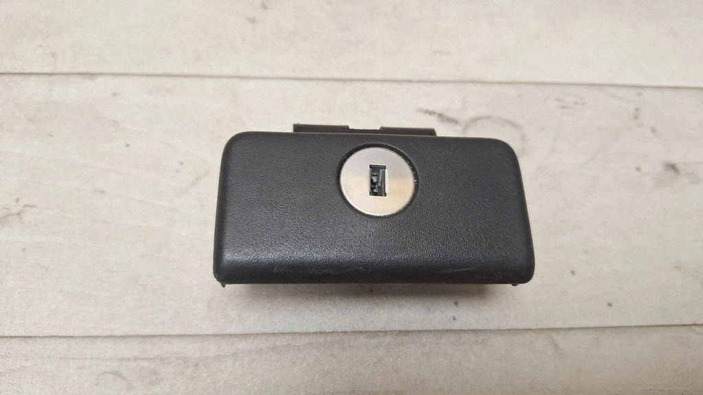 Glove box lock