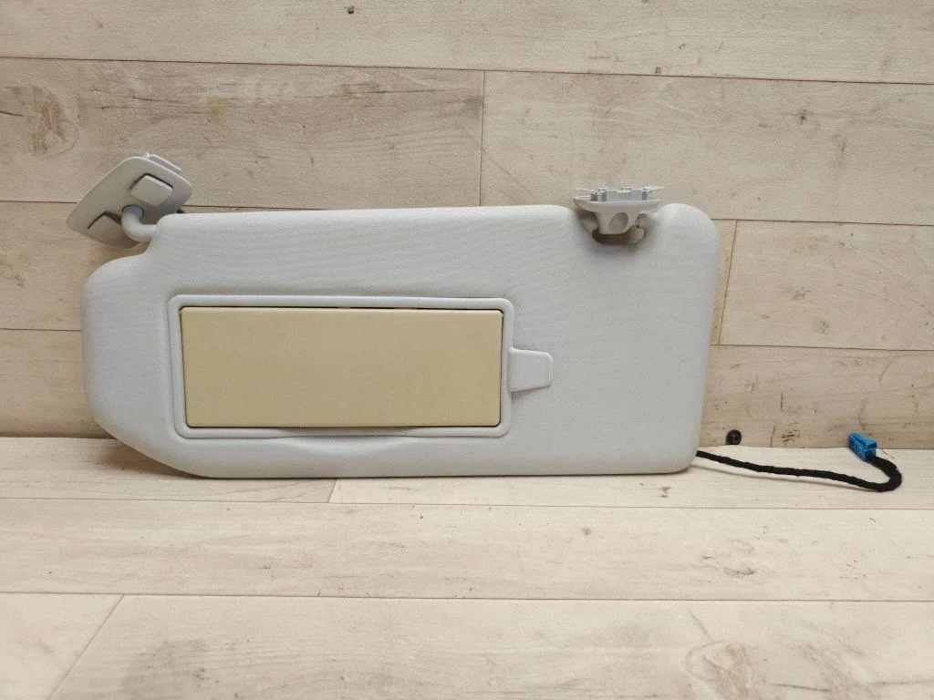 Sun visor – left
