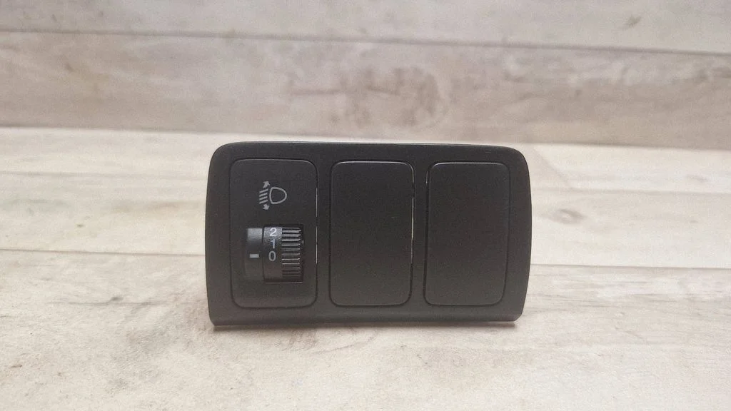 Headlight level height control switch