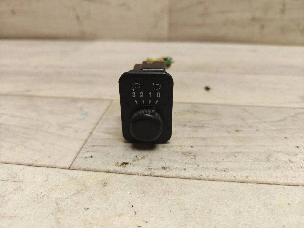 Headlight level height control switch