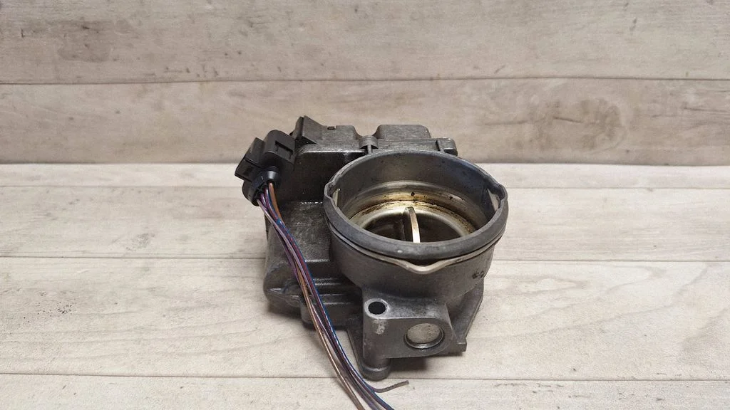 Throttle valve 03G128063J