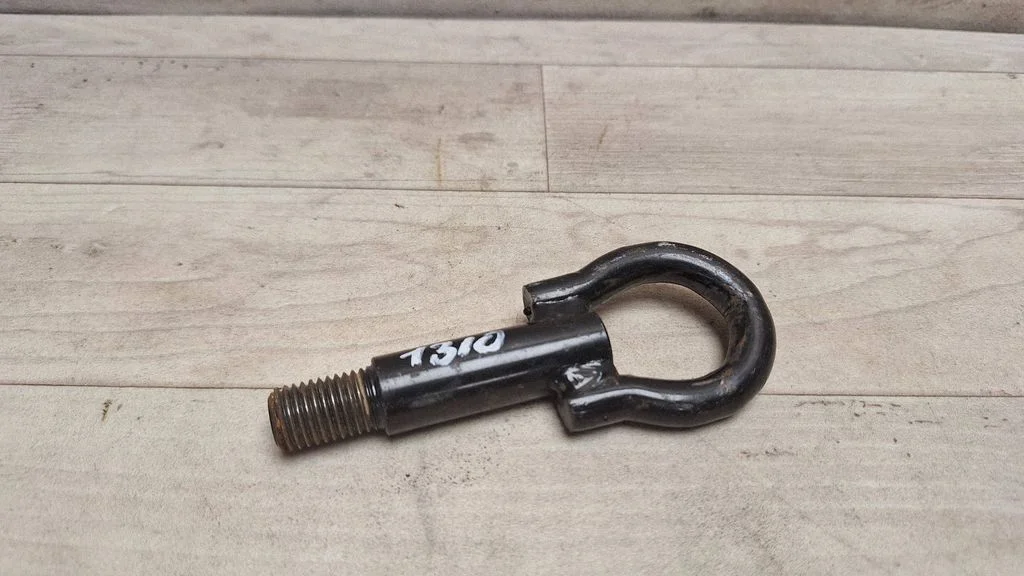 Towing hook eye
