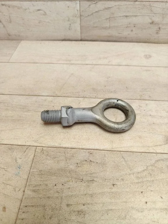 Towing hook eye