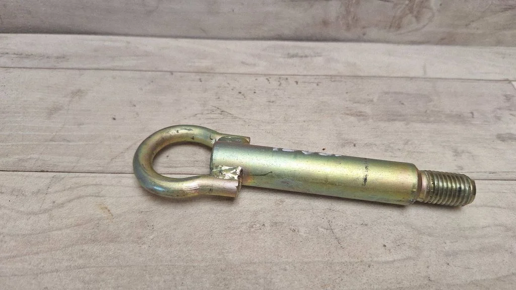Towing hook eye