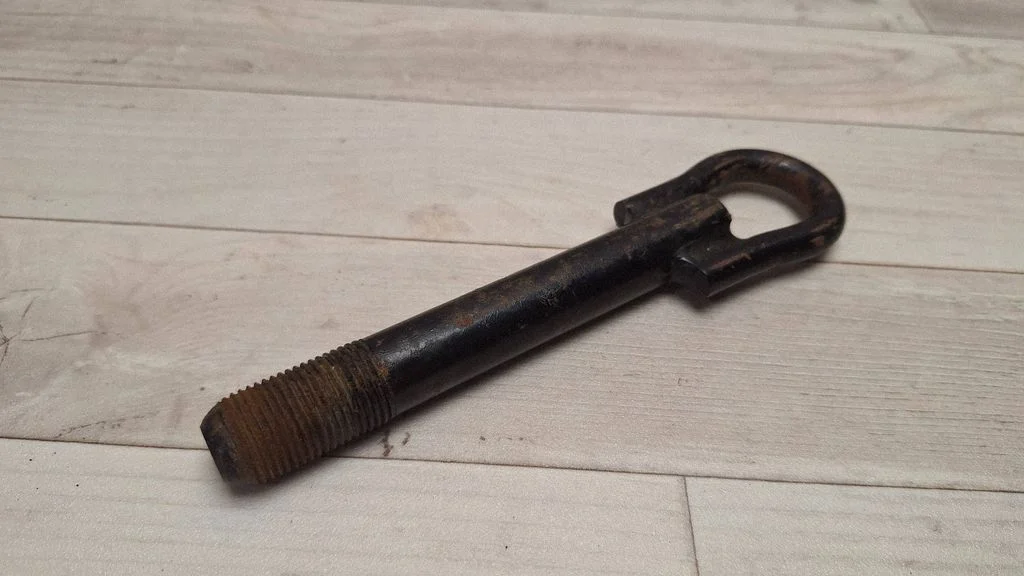 Towing hook eye