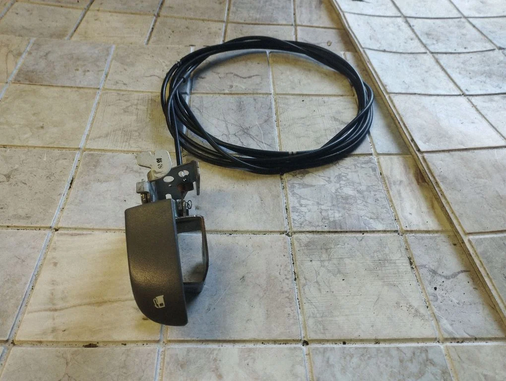Fuel cap release pull handle – Mazda 6 (2002-2008)
