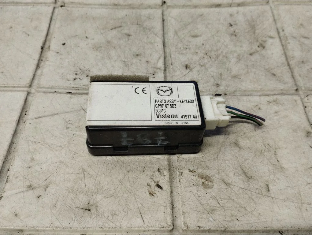 Võtmeta süsteemi KESSY (keyless) juhtplokk/moodul – Mazda 6 (2002-2008)