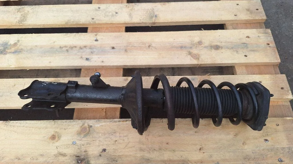 Rear shock absorber with coil spring – rear right
