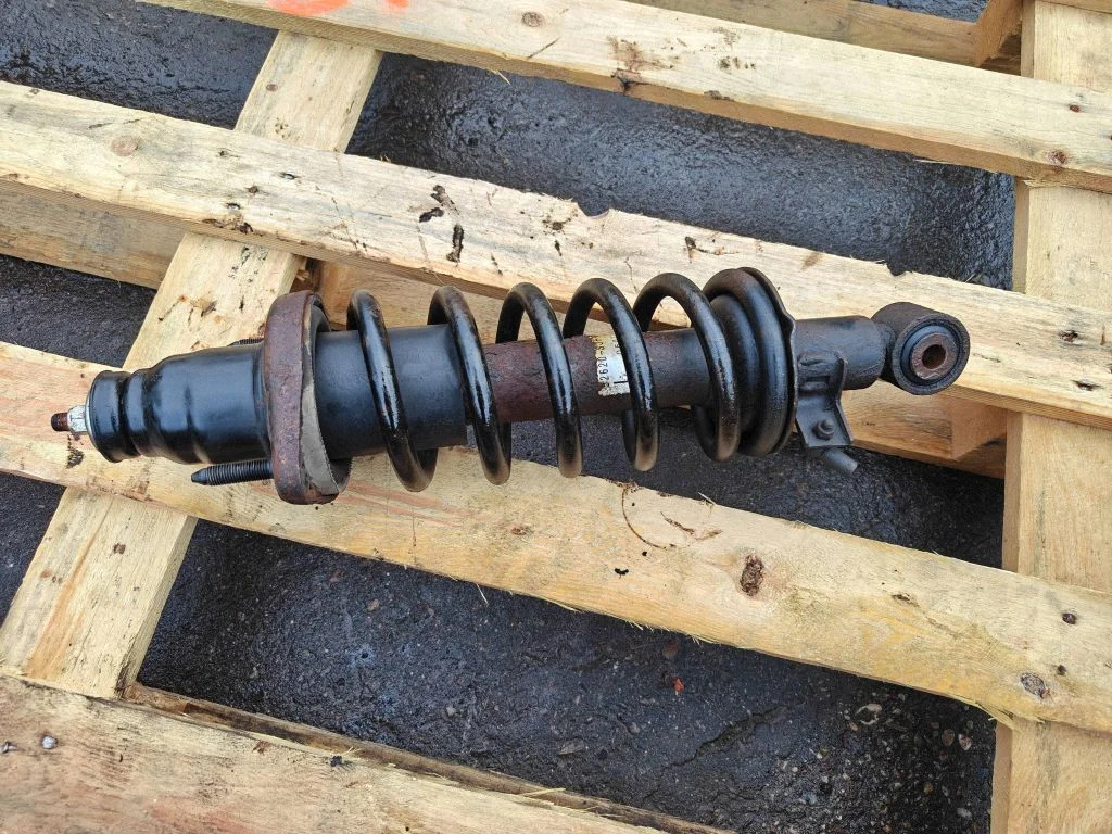 Rear shock absorber with coil spring – rear left